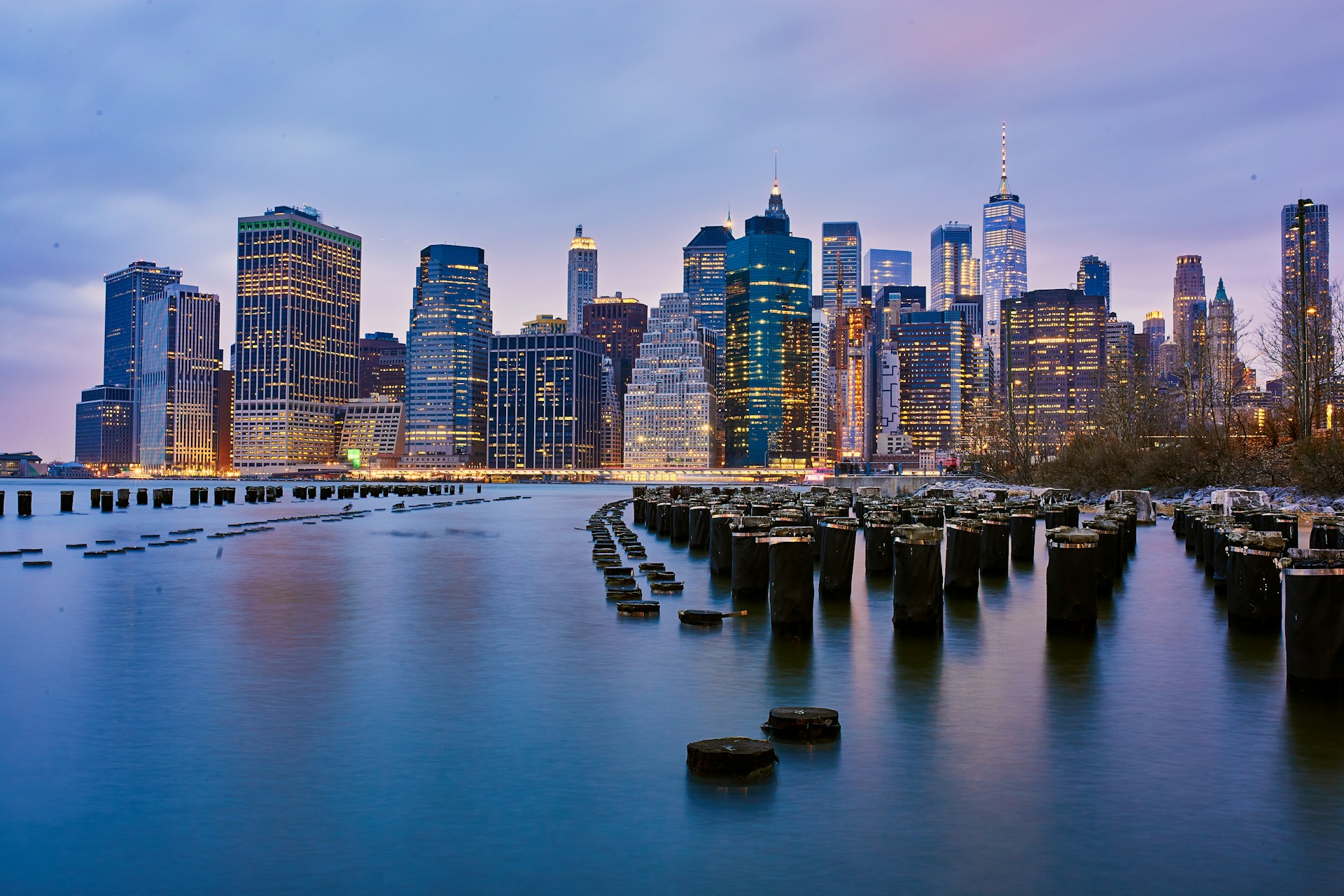 city buildings during nighttime in panoramic view photography