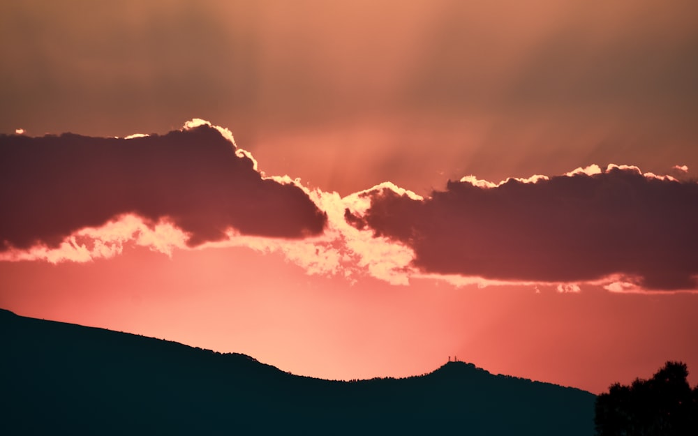 silhouette photo of mountain during golden hour