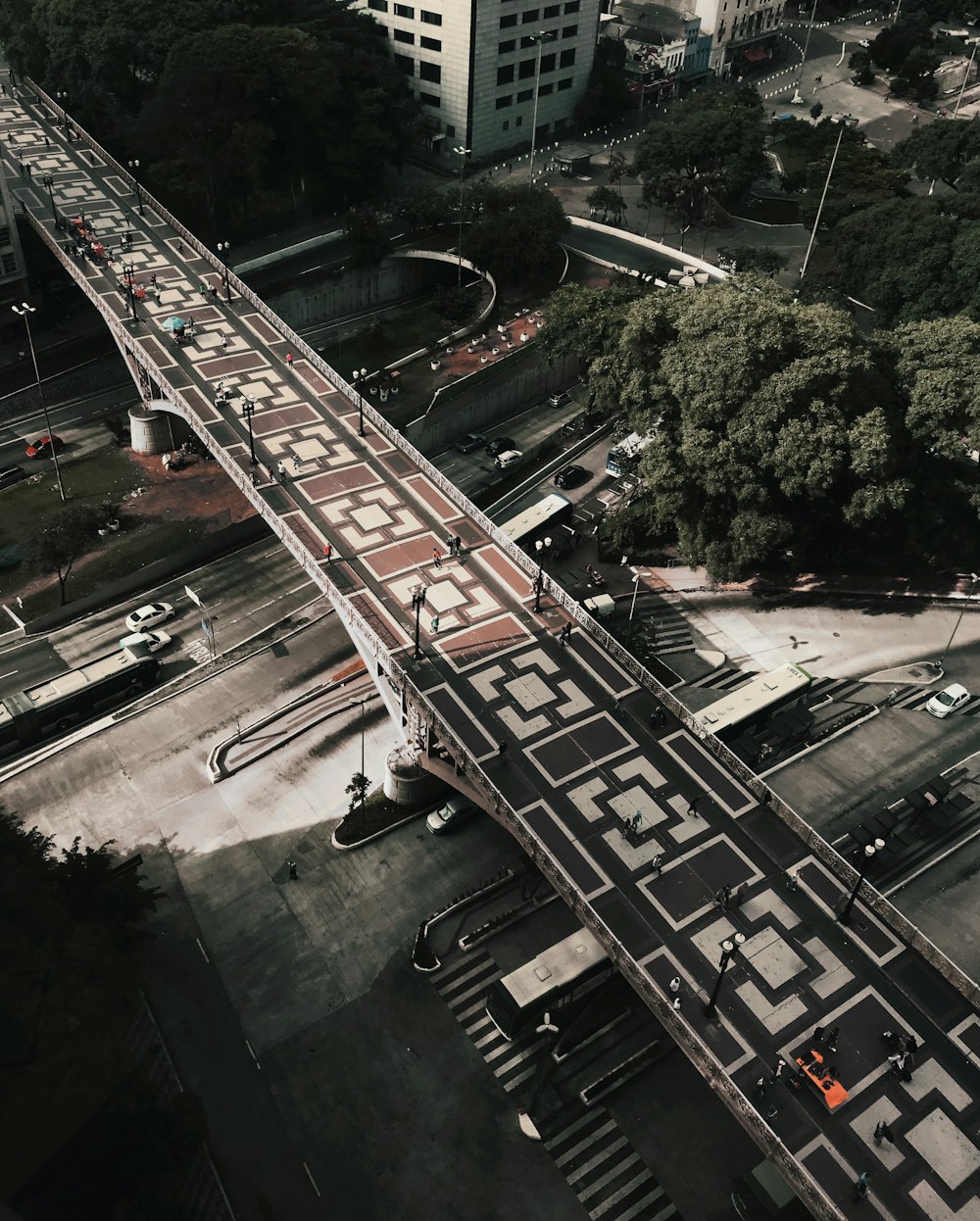 bird's eye view photography of a concrete bridge