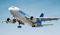 photo of gray and blue Transat airplane