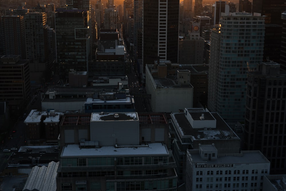 white and black concrete buildings at dusk