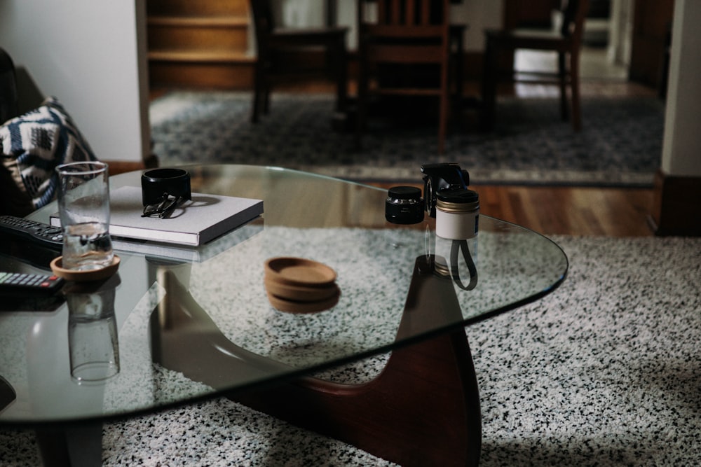 clear drinking glass on clear glass table