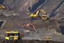 photography of excavators at mining area