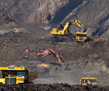 photography of excavators at mining area