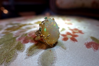 Close-up of opal gemstone reflecting soft natural light.