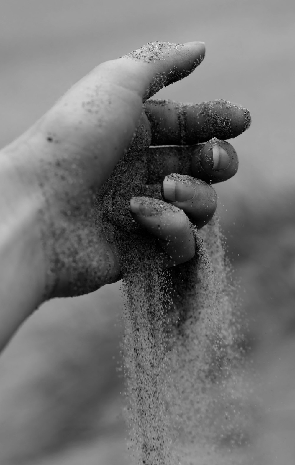 grayscale photo of person palm