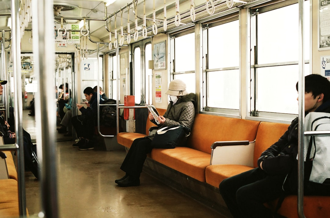 man sitting inside the train,