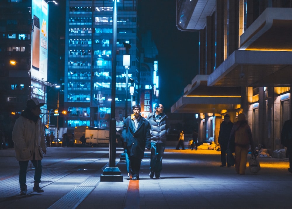 two men walking on street