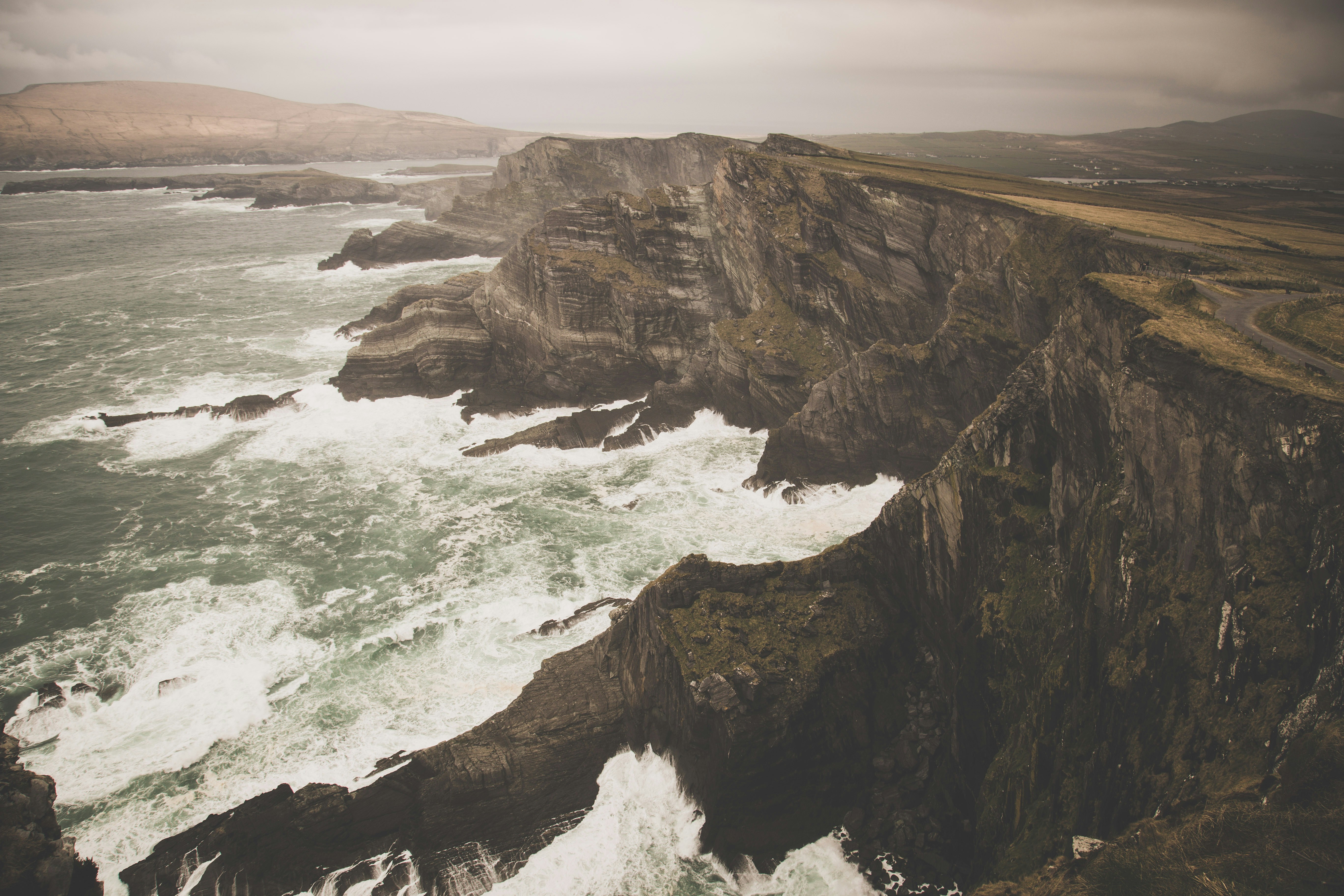 Stormy sky over a cliffside mansion