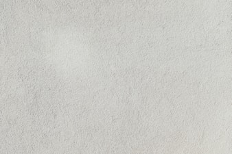 a close up of a white stucco wall