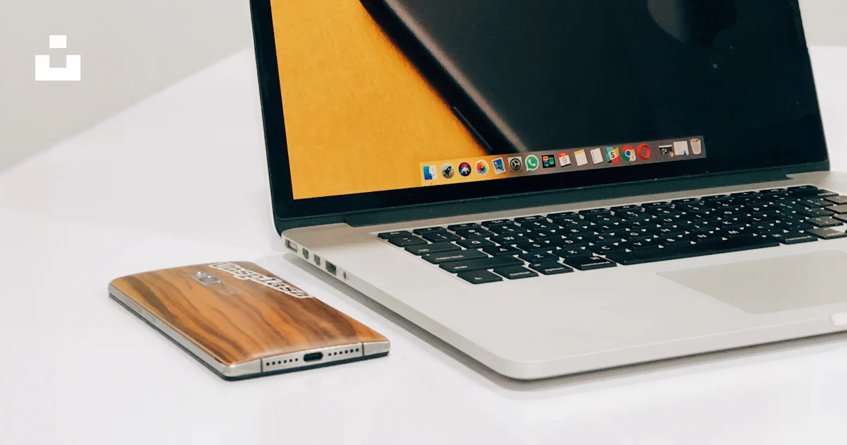 MacBook Pro on table photo – Free Laptop Image on Unsplash