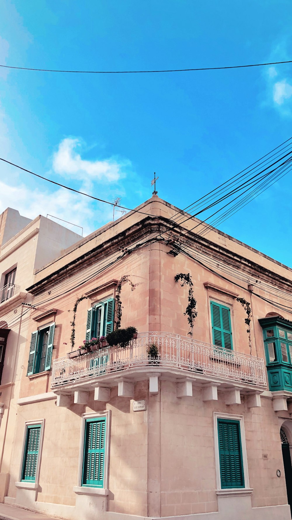 brown 2-storey building during day time