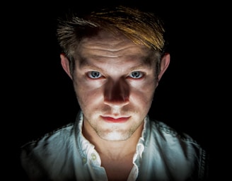 man in white collared top