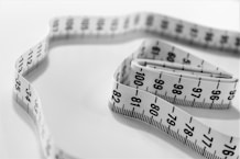 selective focus photography of tape measure