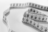selective focus photography of tape measure