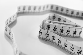 selective focus photography of tape measure