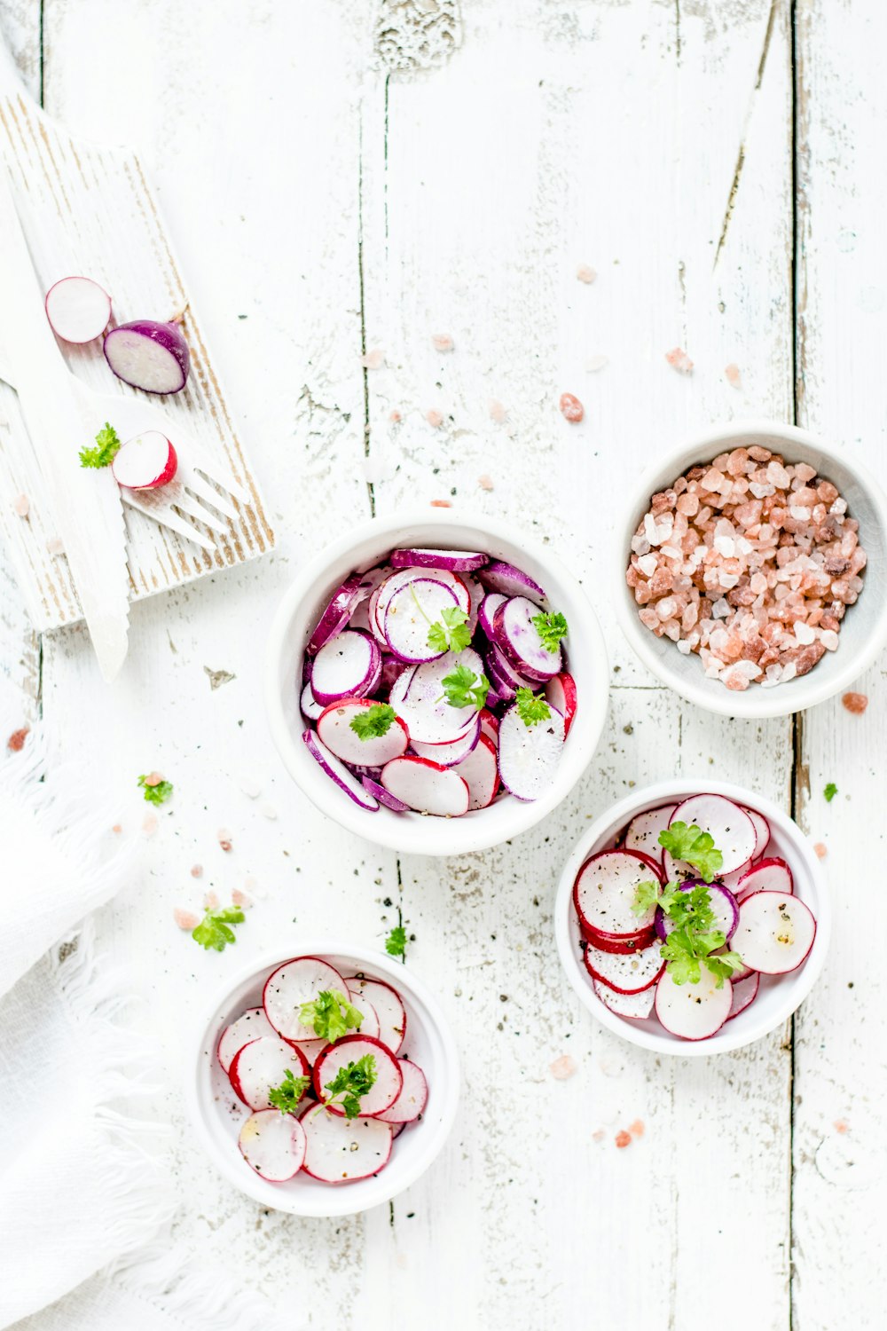 white ceramic bowls with foods