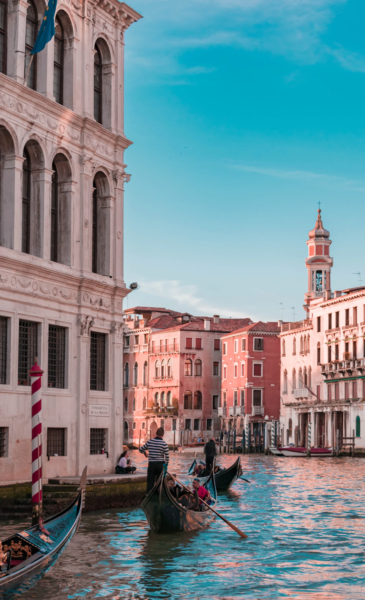 Gondola on a Venice canal with historic buildings