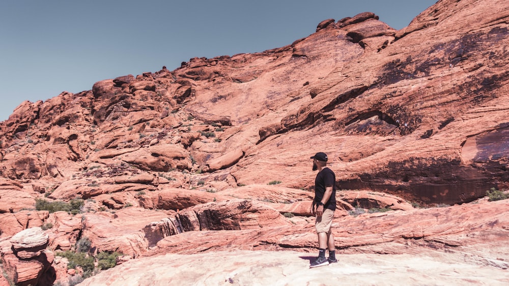 photography of man standing on ground