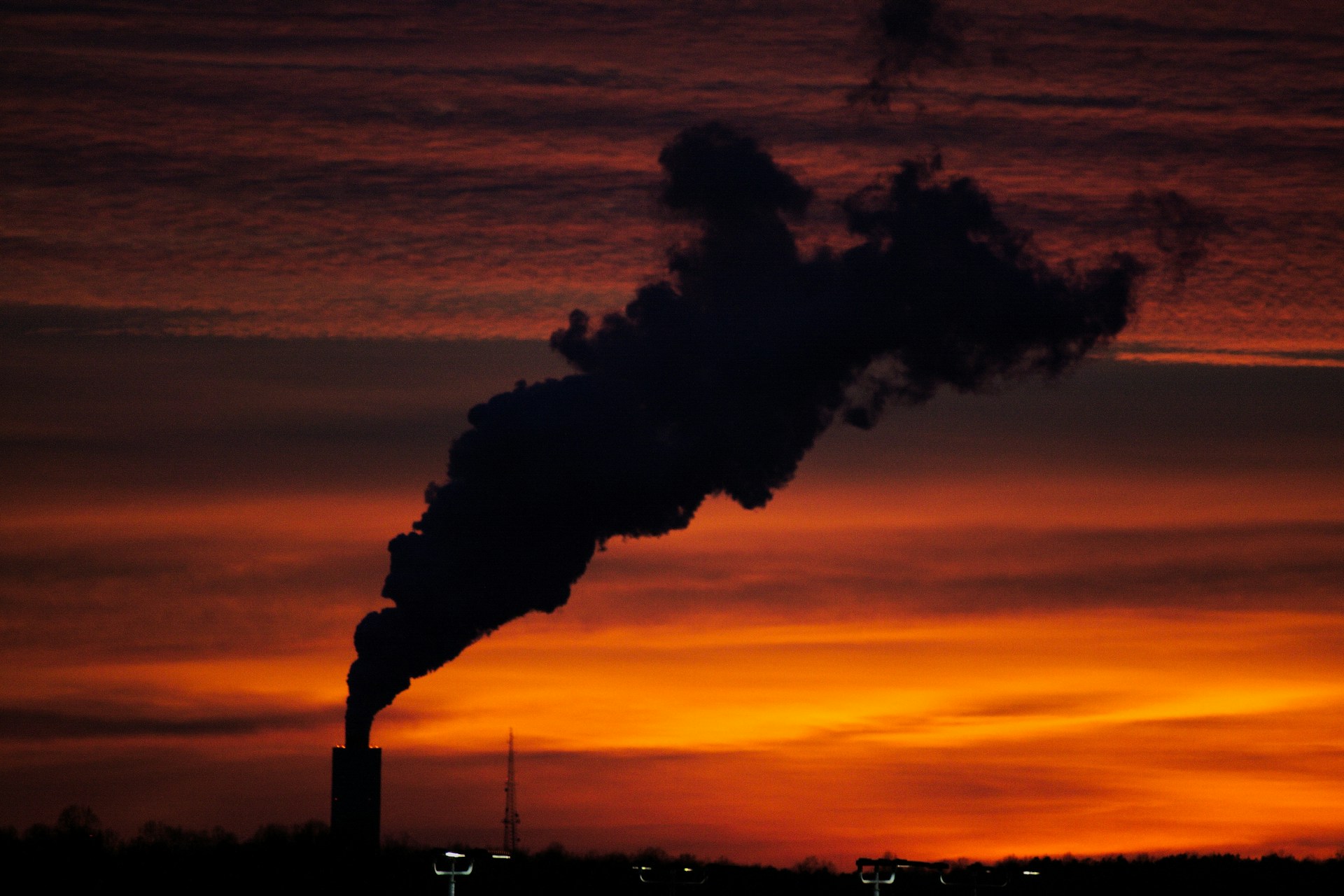 silhouette of factory smoke