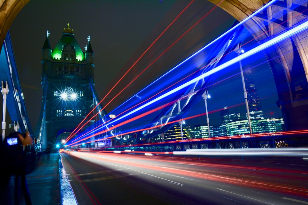 timelapse photography of traveling vehicles on Tower Bridge