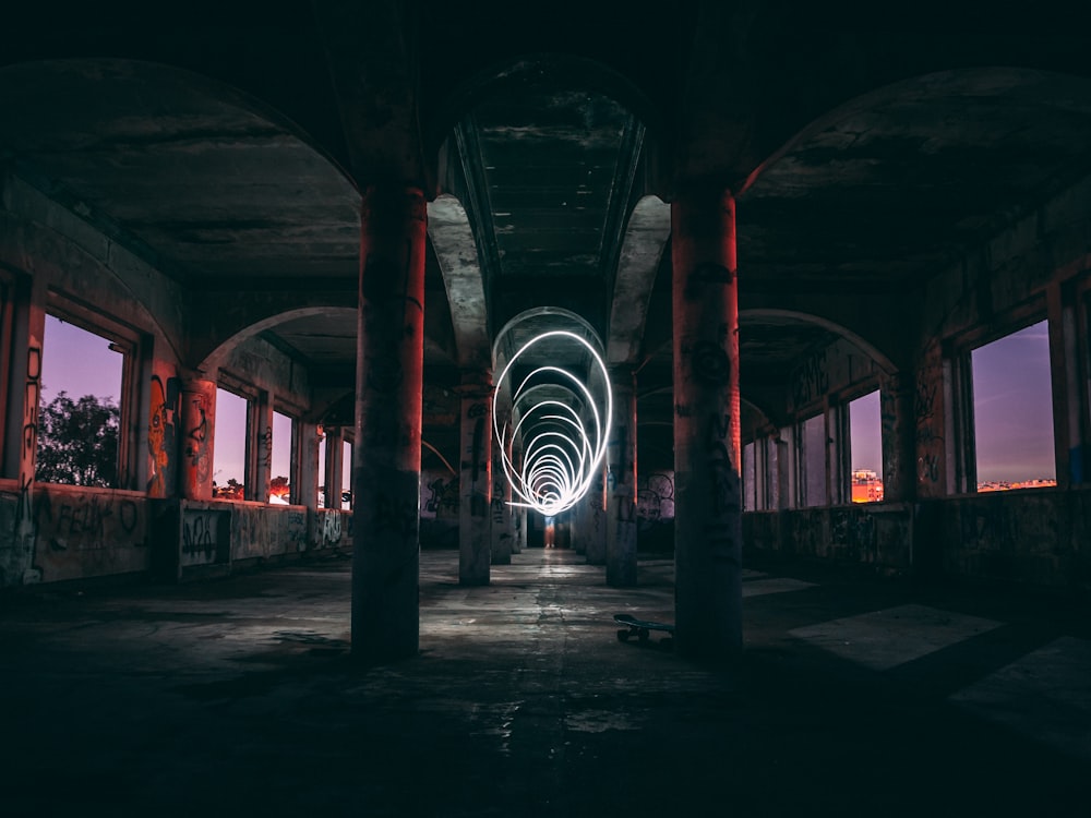 a long exposure of a tunnel in the middle of a building