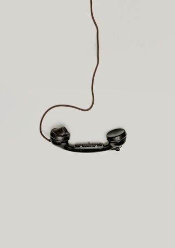 Person speaking on phone with global communication visualization