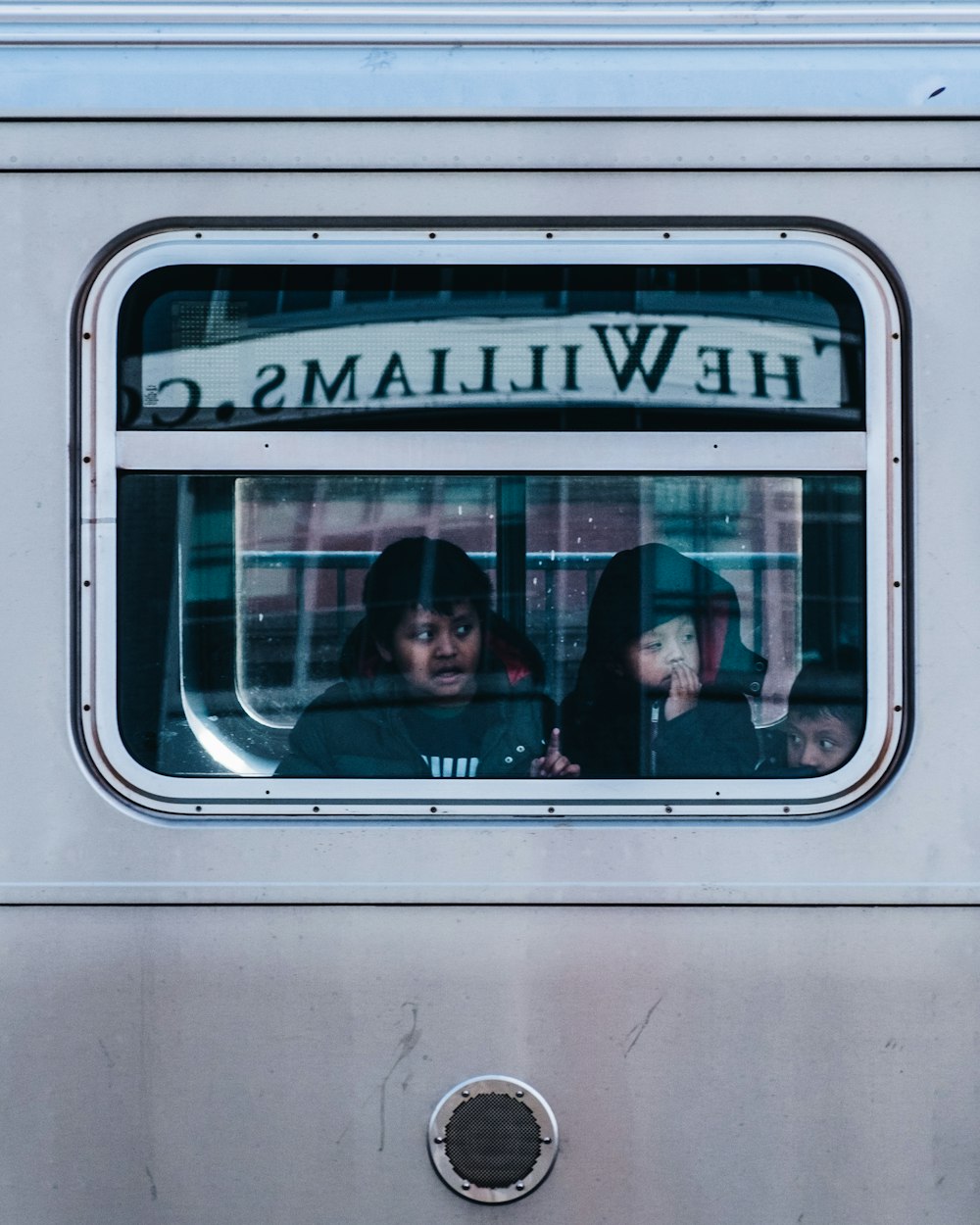 kids looking outside window