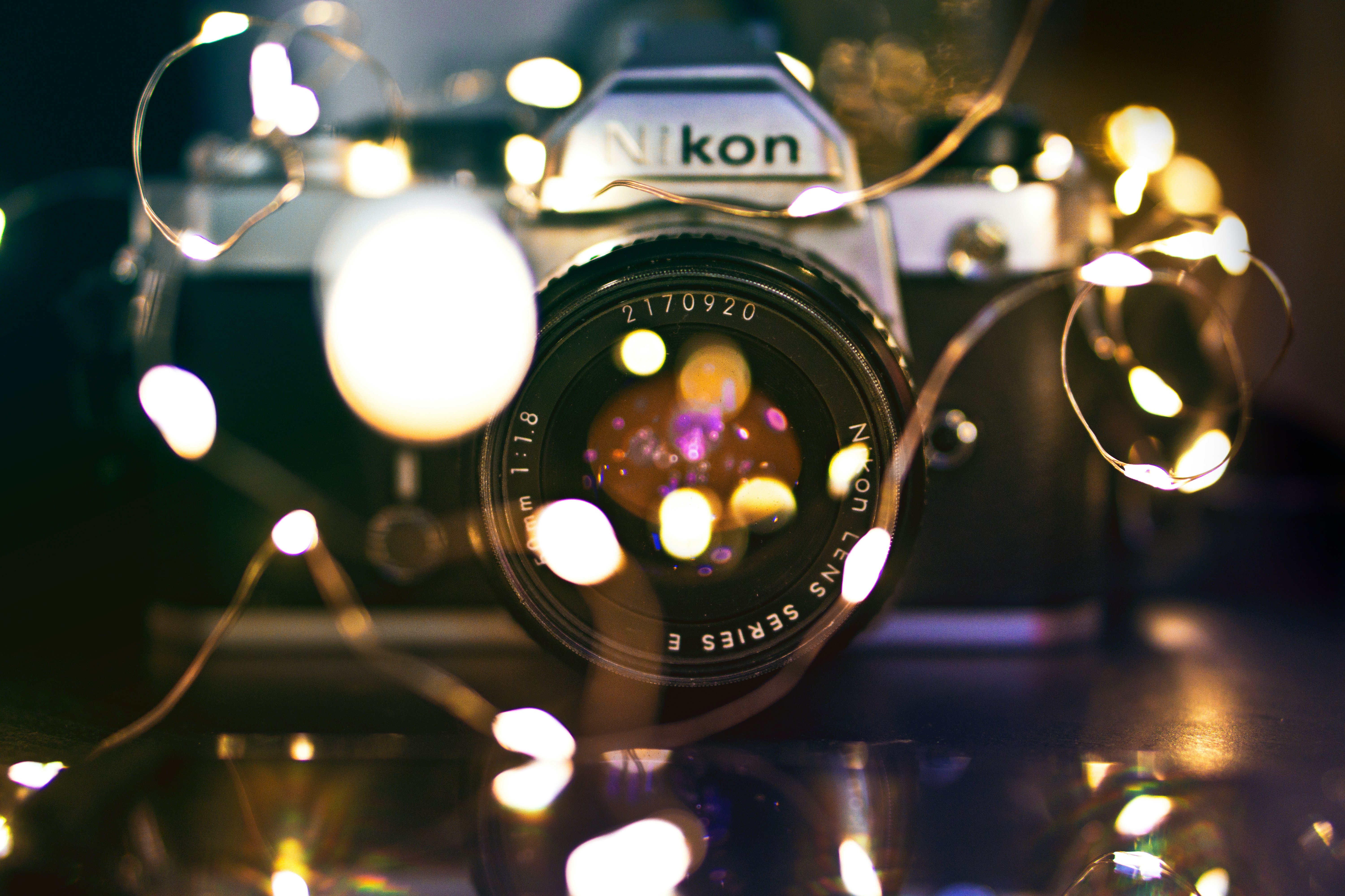bokeh photography of Nikon DSLR camera