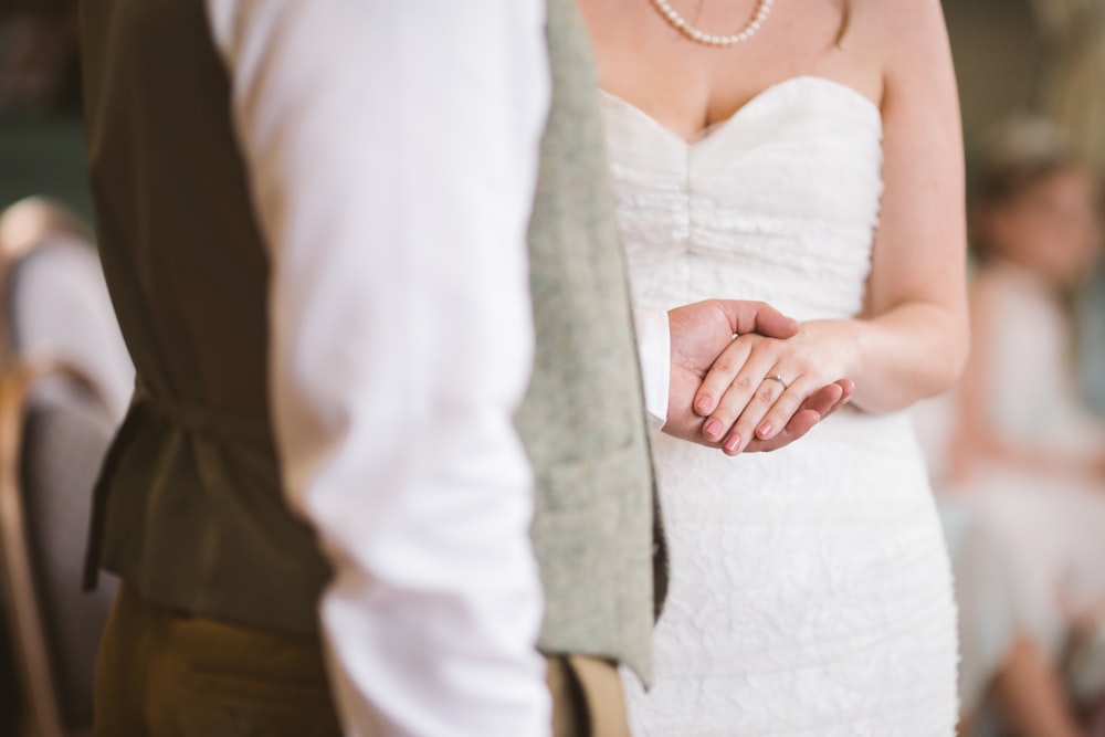 two person holding hands