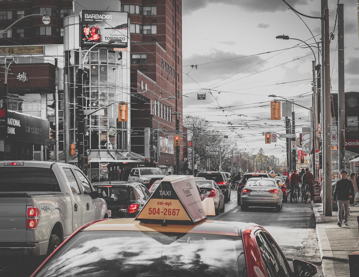 Taxi driving through a city street