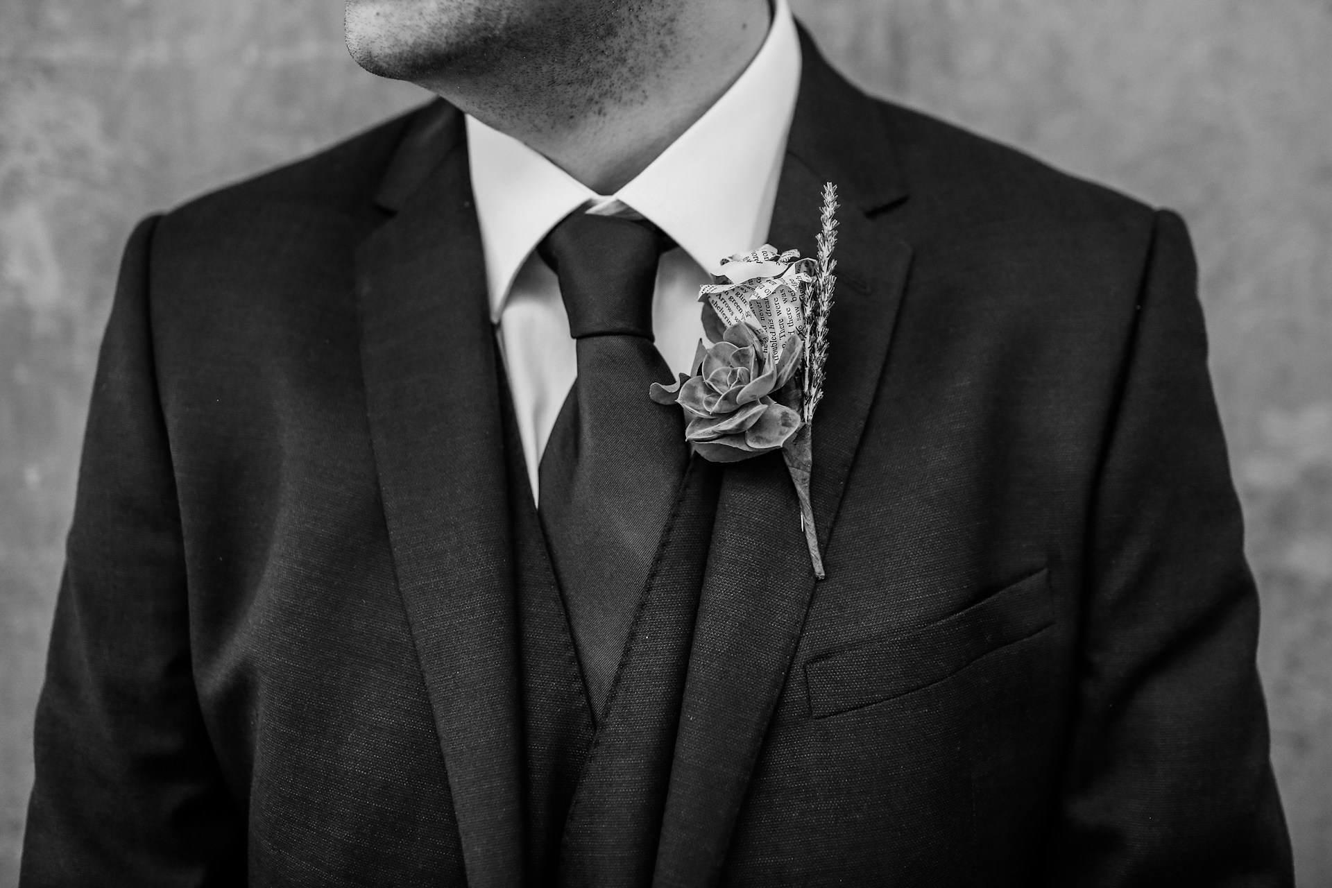 grayscale photo of man looking right