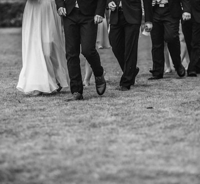 man and woman walking next to each other