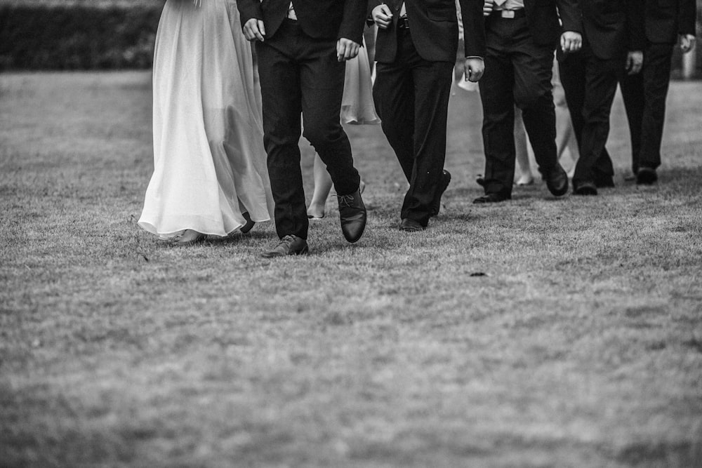 man and woman walking next to each other