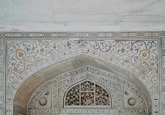 landscape photography of white and grey concrete walls in Agra Fort India
