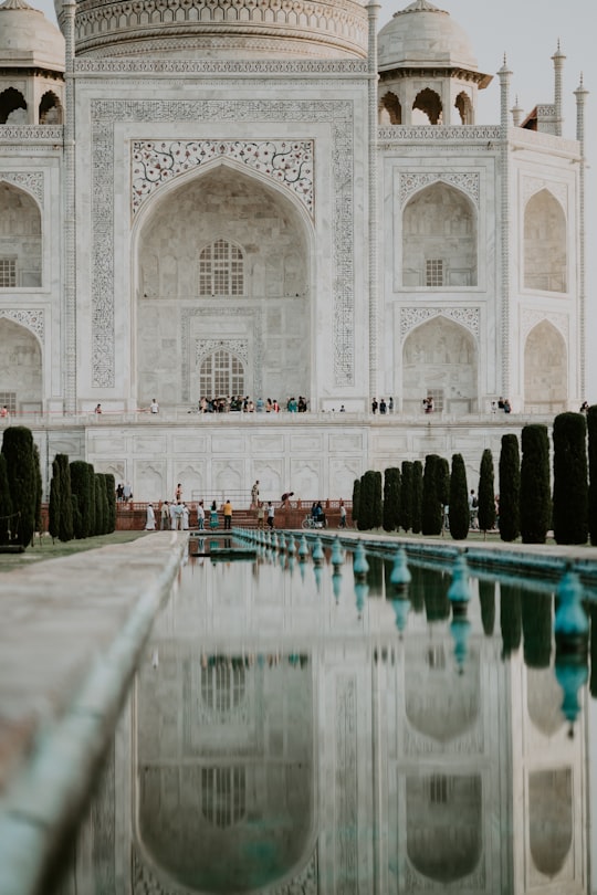 people standing in front of Taj Mahal in Taj Mahal India