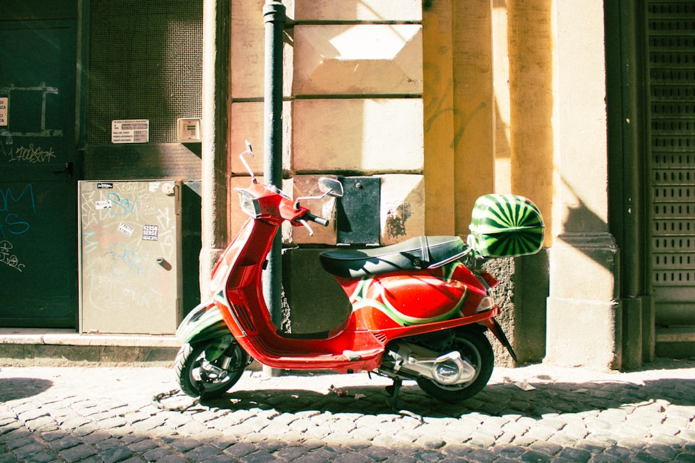 black and red motor scooter