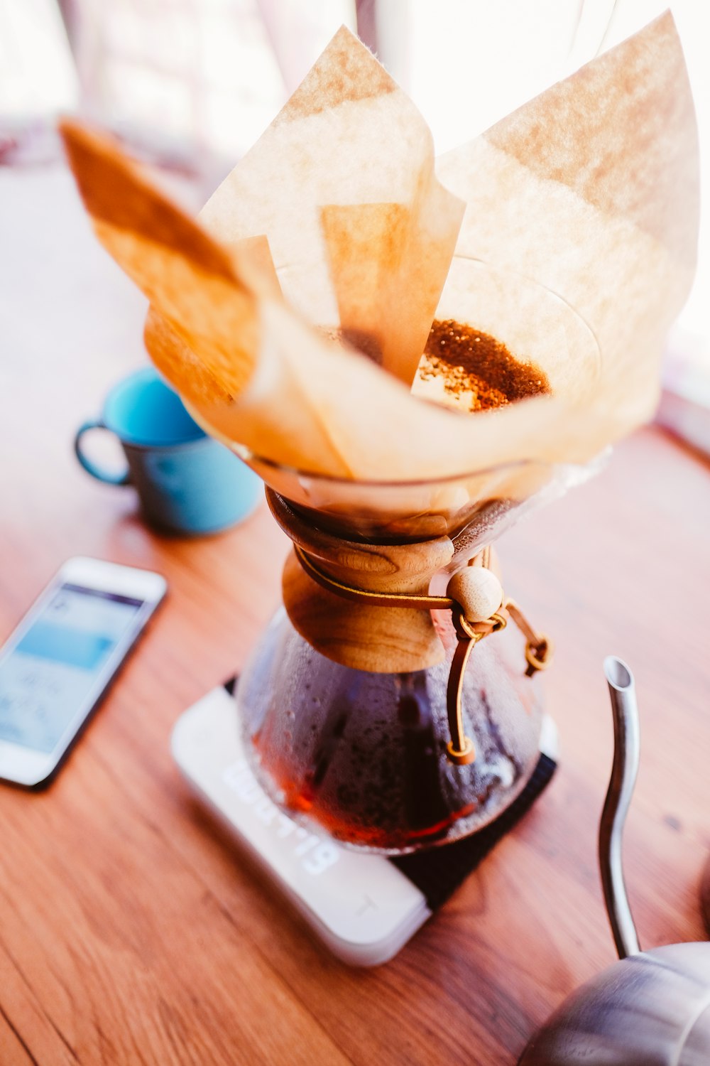 white and brown liquid in clear glass cup