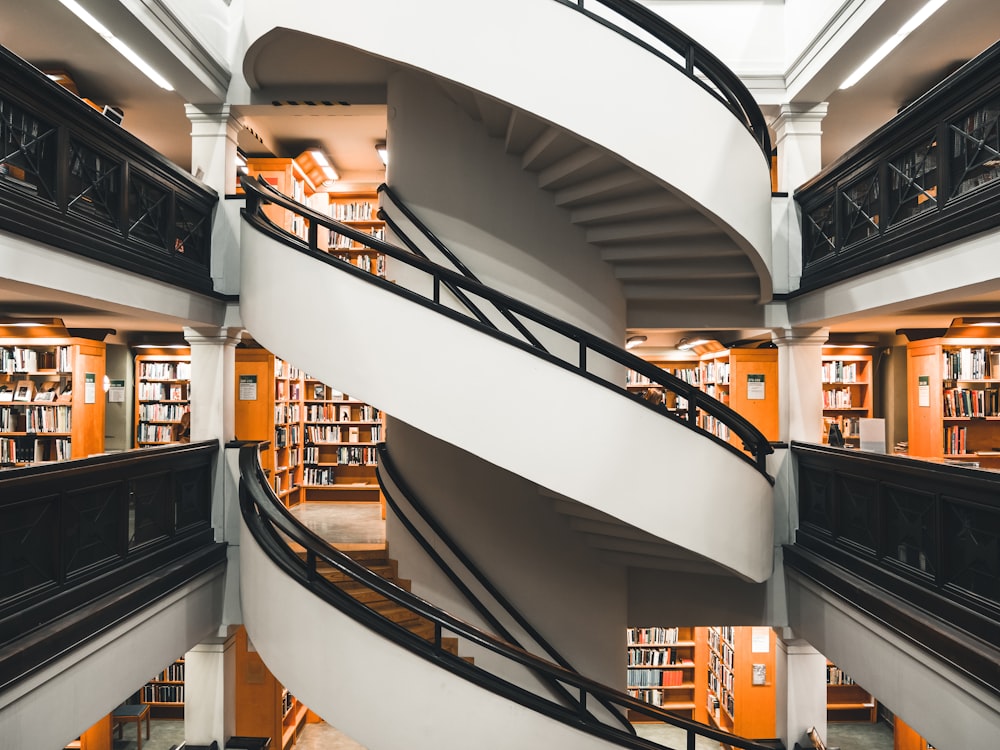 white concrete spiral staircase