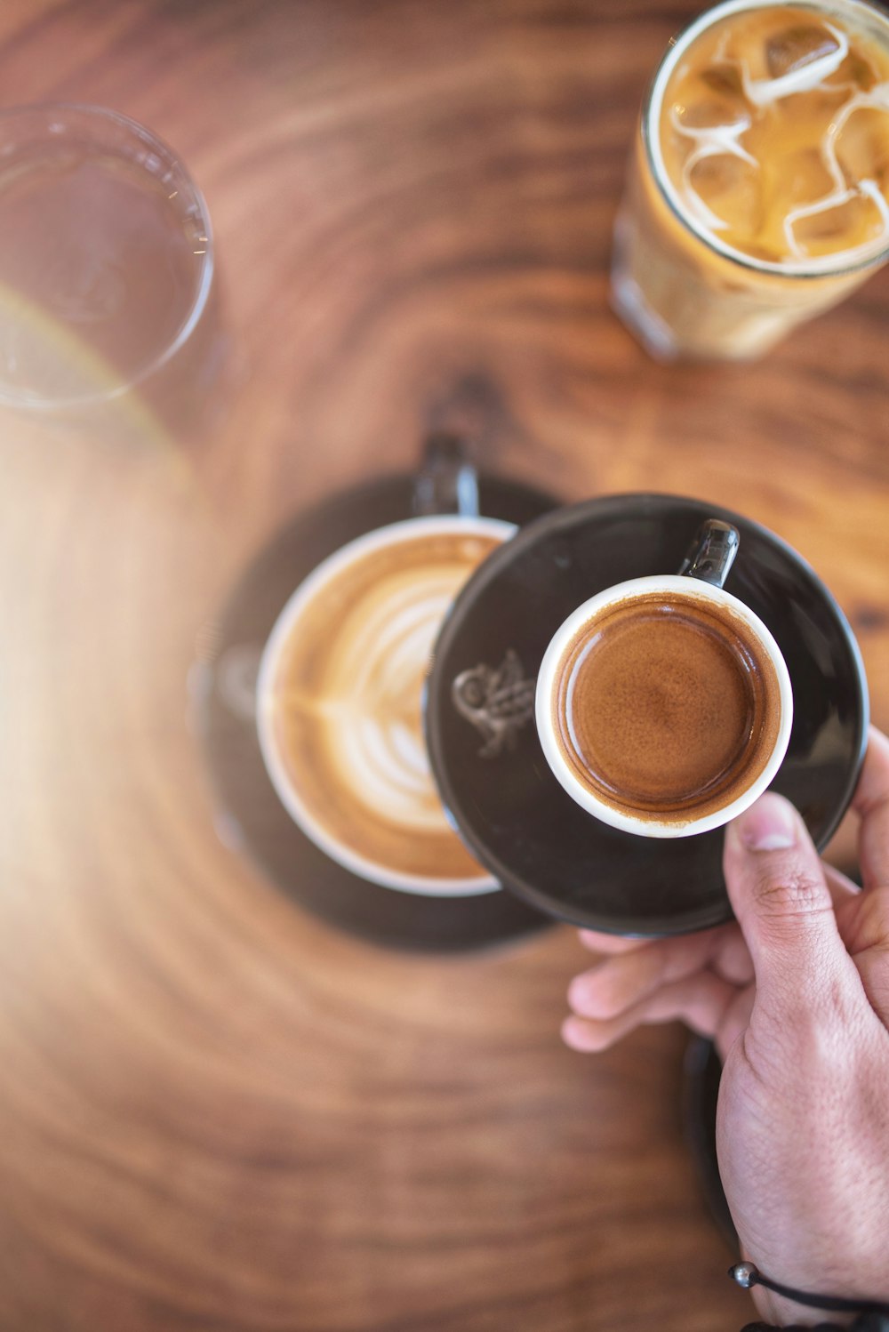 white coffee cup with coffee close-up photography