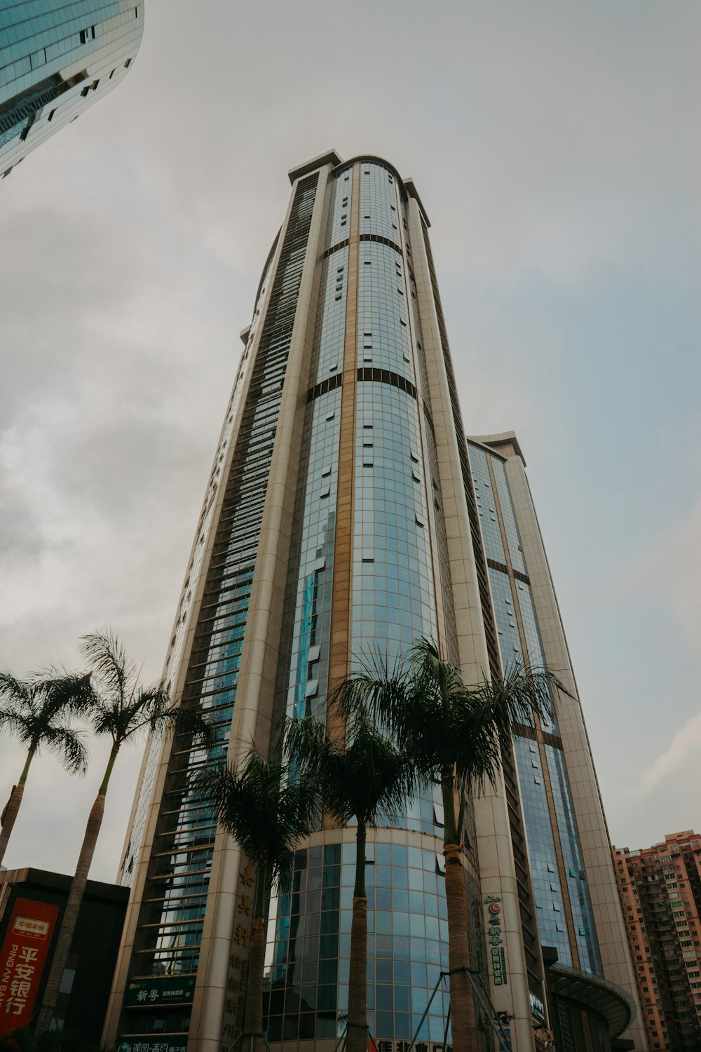 low angle photography of curtain wall building