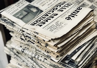 bundle of newspaper on table