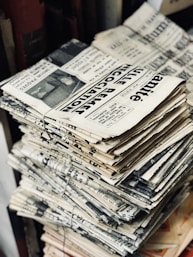 bundle of newspaper on table