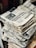 bundle of newspaper on table