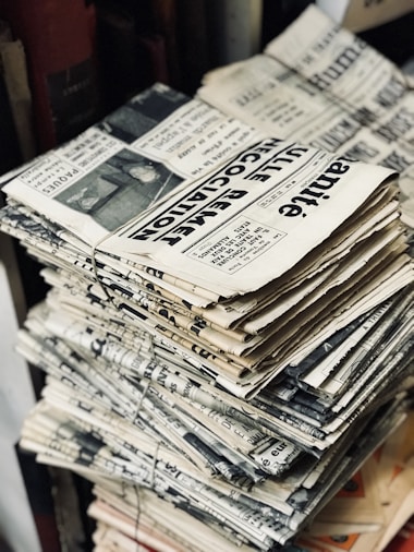 bundle of newspaper on table