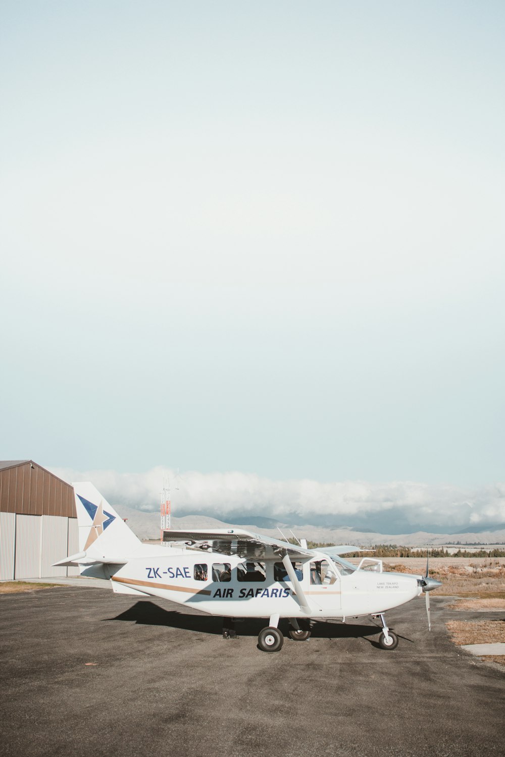 white Air Safaris plane at the airport