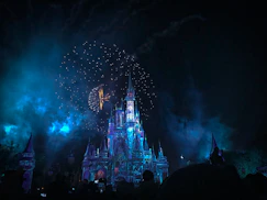 crystal castle with fireworks at night