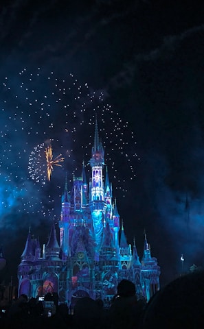 crystal castle with fireworks at night