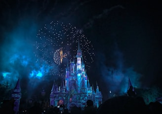 crystal castle with fireworks at night