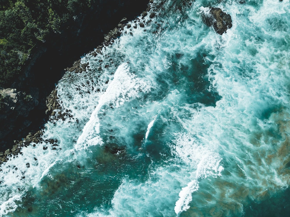 aerial view photography of ocean waves during daytime